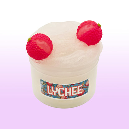 Lychee slime with lychee toppings on a pink background