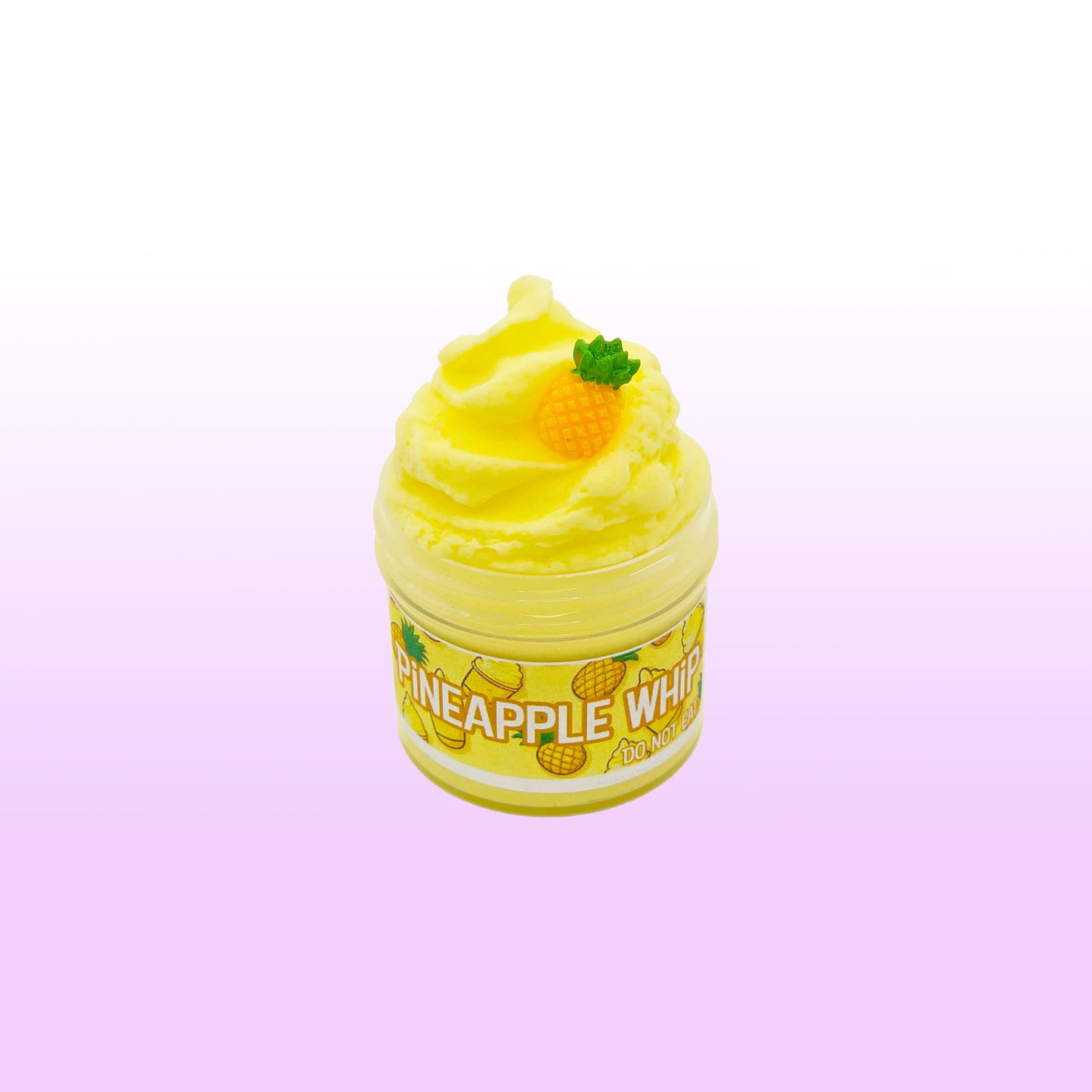 Yellow pineapple-themed product on a light purple background
