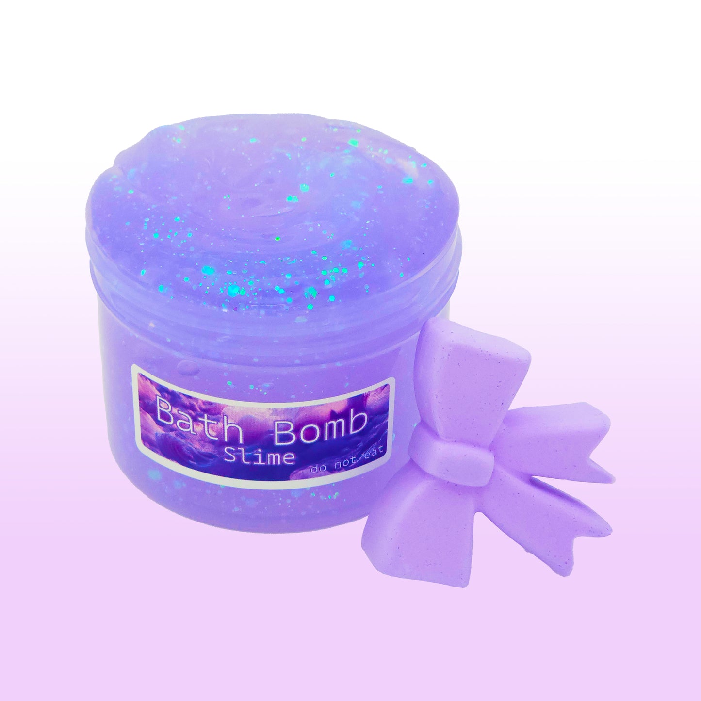 Light purple jelly slime with pearl glitter and purple bow clay bath bomb topper